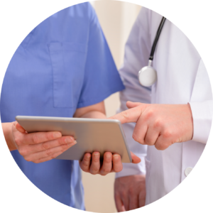 Nurses using a table to access the Cloud-Based Magnet® & Pathway to Excellence® Platform from Creative Health Care Insight