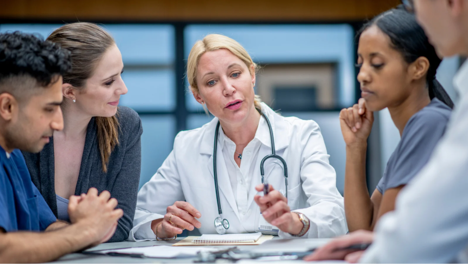 Healthcare leadership team meeting discussing succession planning strategy | Creative Health Care Insight