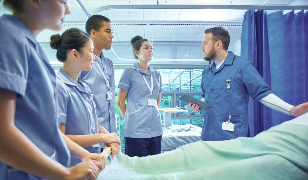 Healthcare professionals learning new clinical technology and skills in a modern healthcare environment | CHCI