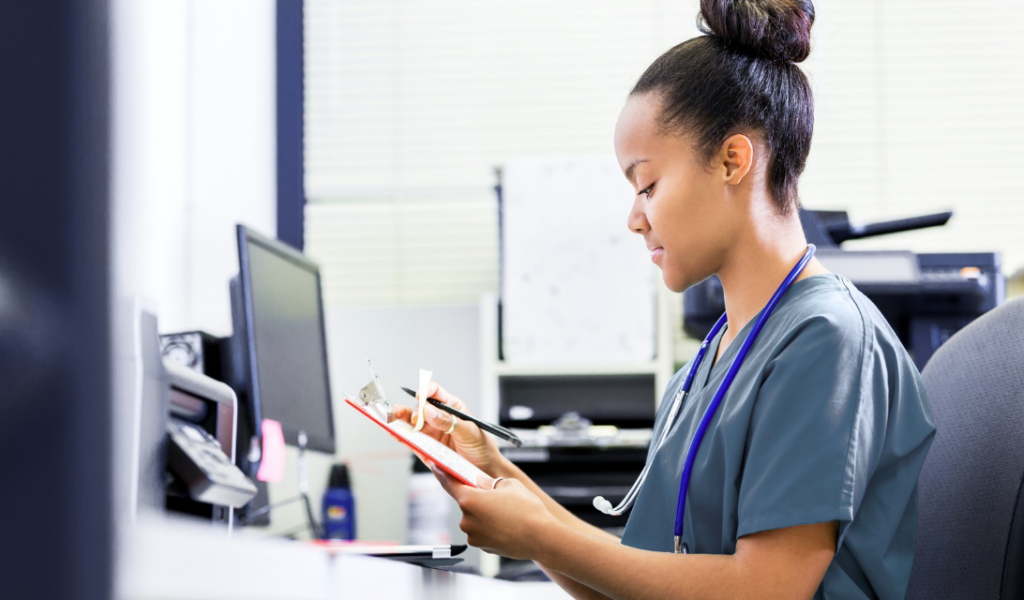 Nurse educator reviewing competency tracking data to improve workforce readiness in healthcare | CHCI