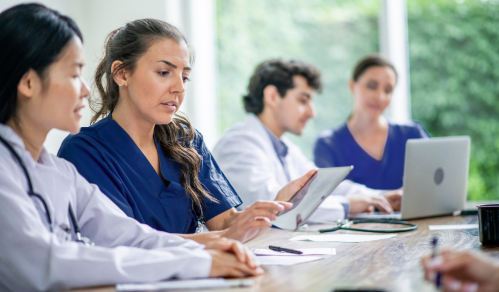Healthcare leaders discussing succession planning and future leadership development | Creative Health Care Insight