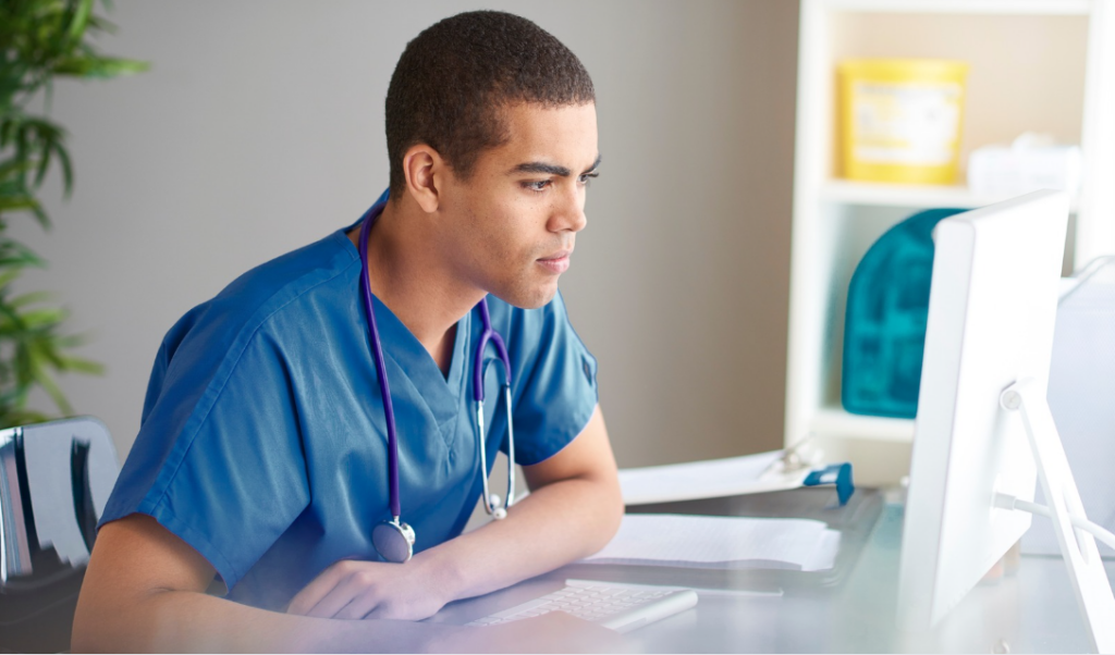 Healthcare leader reviewing workforce data to support nurse retention strategies | Creative Health Care Insight