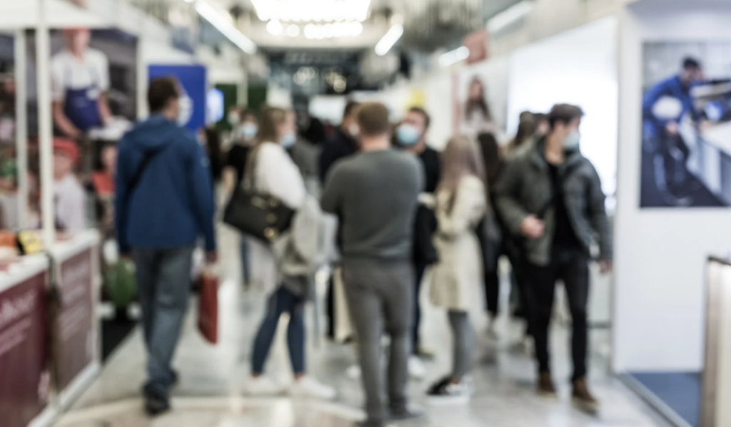 Wide Shot of a Convention Hall Floor Filled With Health Care Exhibit Booths | Creative Health Care Insight