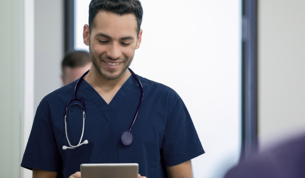 Healthcare employee reviewing peer feedback for professional development | Creative Health Care Insight