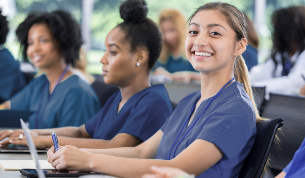 Charge Nurse Mentoring a Newer Colleague on the Floor | Creative Health Care Insight