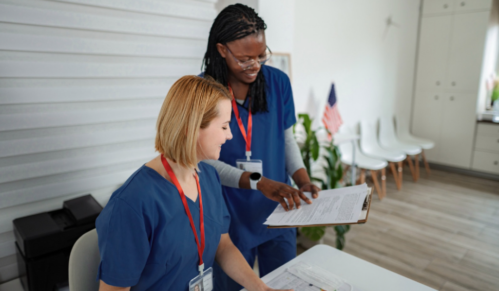 Nurse Presenting Research Findings During a Shared Governance Meeting | Creative Health Care Insight