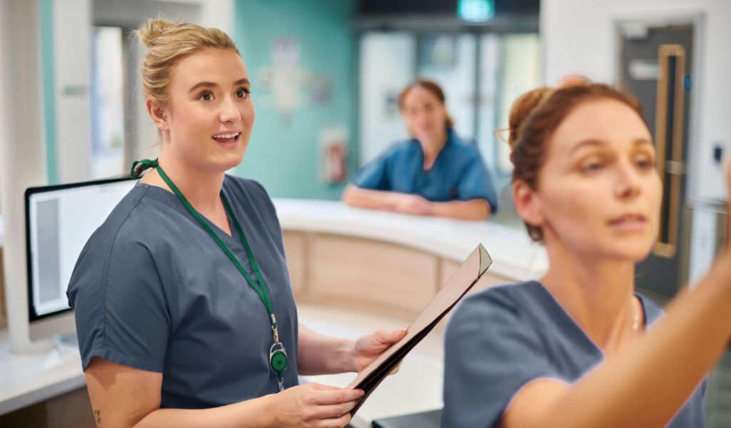 Nurse manager mentoring a charge nurse about leadership responsibilities | Creative Health Care Insight